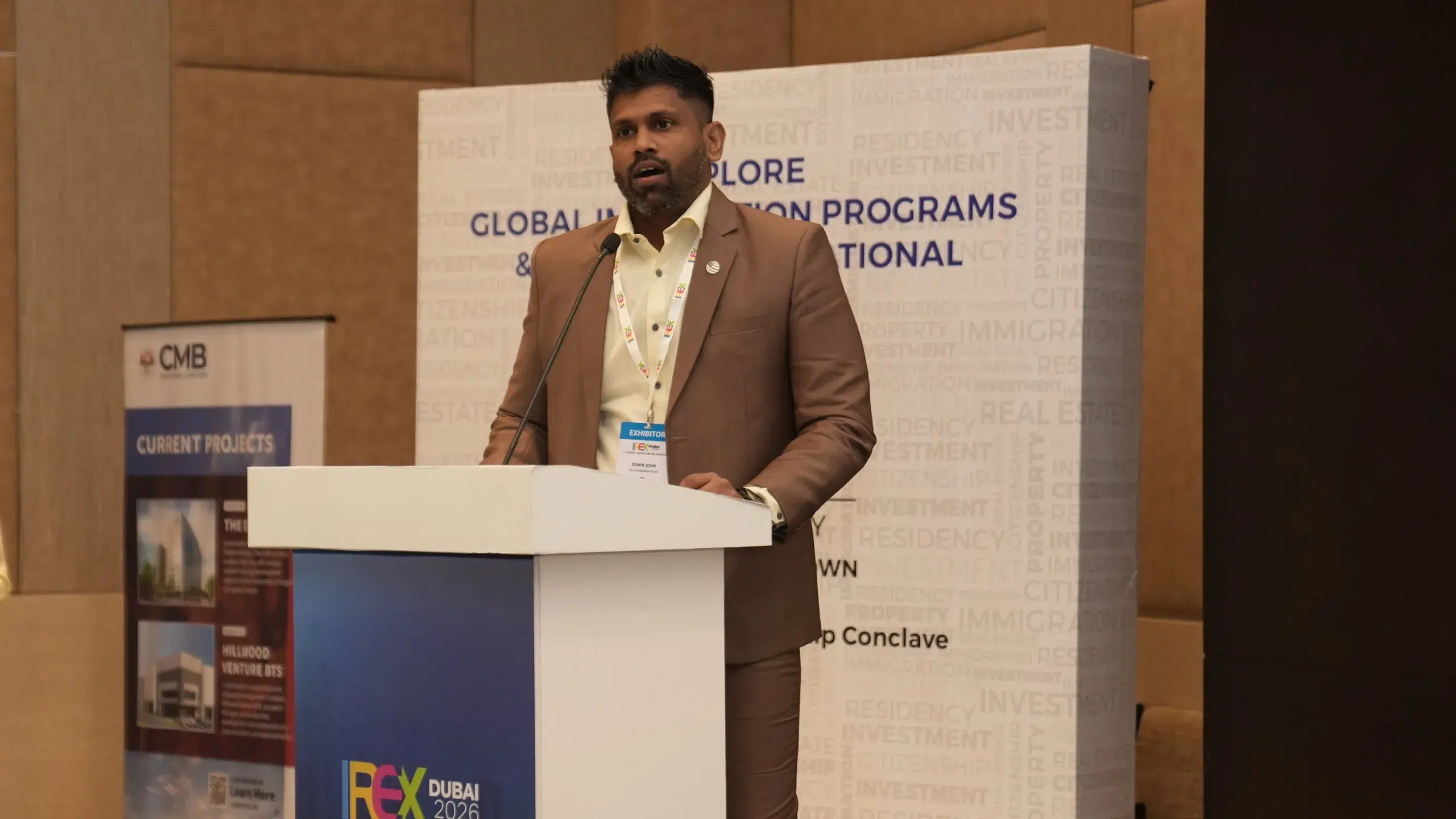 Edwin John, U.S. Immigration Fund Director presenting EB-5 visa and global residency investment opportunities at IREX event